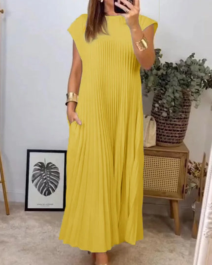 women's elegant sleeveless dress with pockets in yellow pleated style, perfect for sunny days and stylish outings.