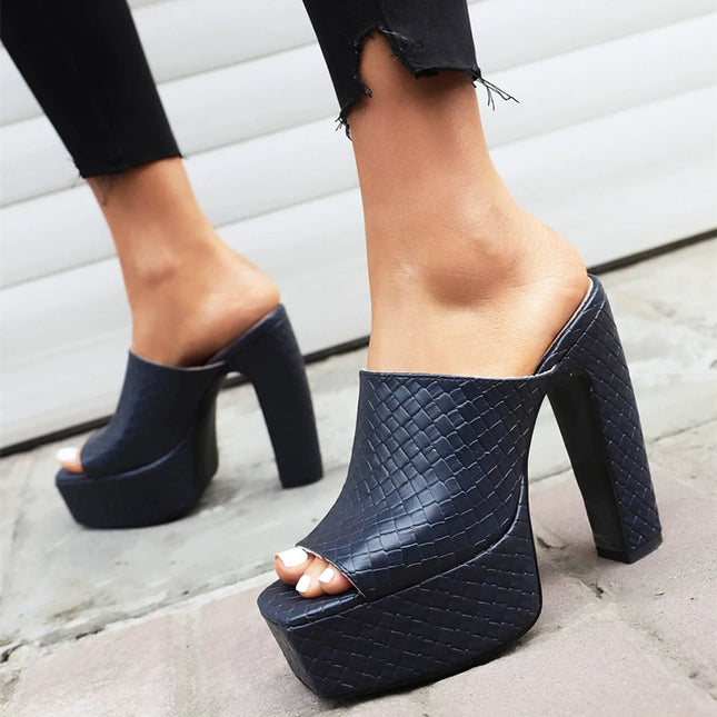 Sexy high heels platform slides in black leather, featuring a stylish mule design and chunky heel for summer fashion.