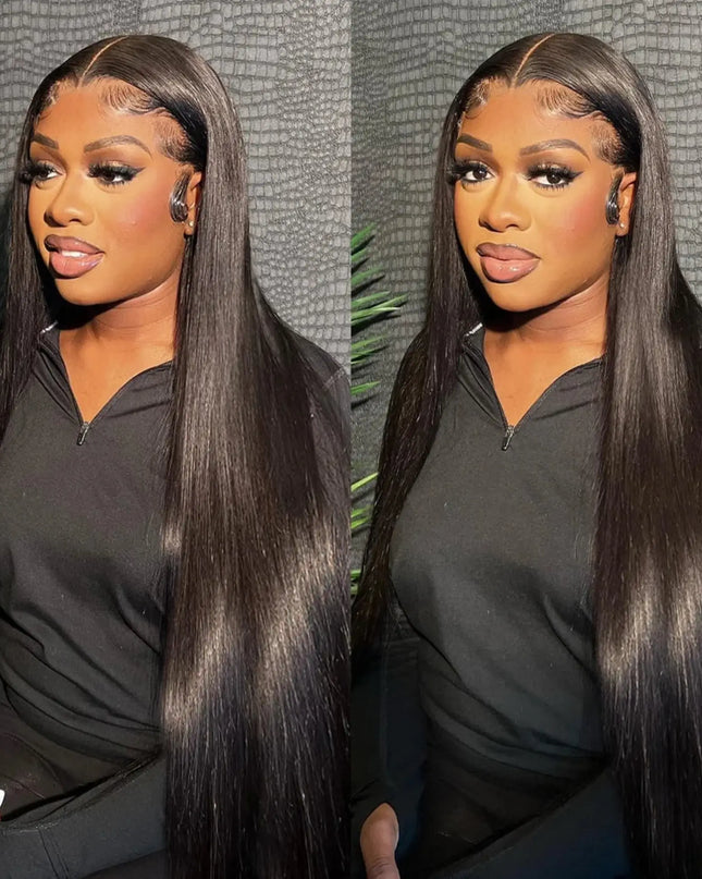 Woman with long straight hair wearing a black top against a textured gray background.
