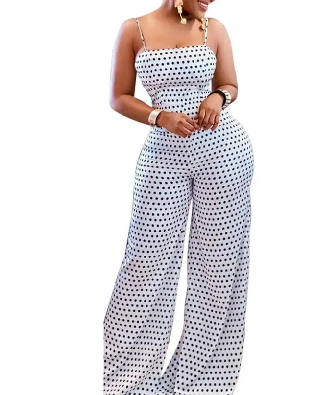 Woman wearing a polka dot jumpsuit on a white background