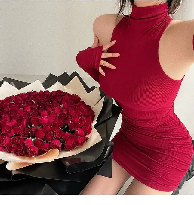 A woman showcasing a red high neck bodycon dress next to a bouquet of roses, perfect for summer outings.