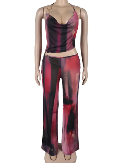 Mannequin wearing a colorful outfit with a top and pants on a white background