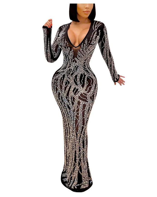 Black and gold patterned dress on a white background