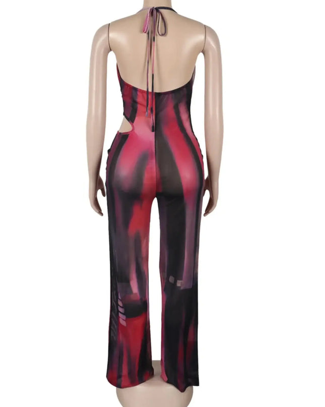 Mannequin wearing a red and black patterned jumpsuit on a white background