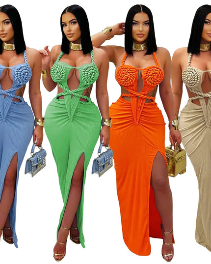 Four women wearing colorful, intricately designed dresses with matching handbags.