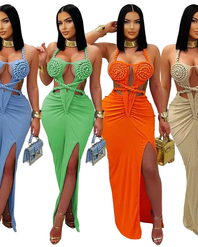 Four women wearing colorful, intricately designed dresses with matching handbags.