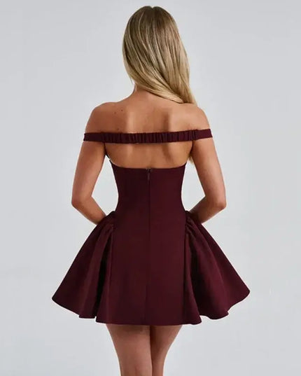 Elegant off shoulder mini dress party in burgundy, showcasing a draped design and flared skirt from the back.
