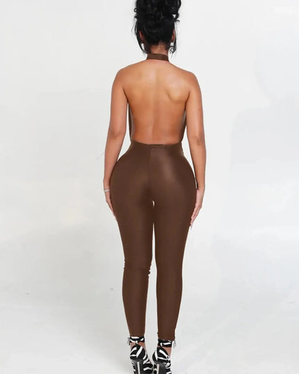 Person wearing a brown jumpsuit on a white background