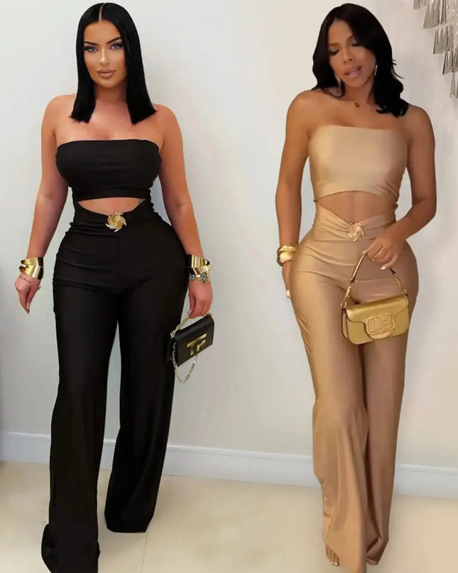 Two women in black and beige strapless jumpsuits with gold accessories.