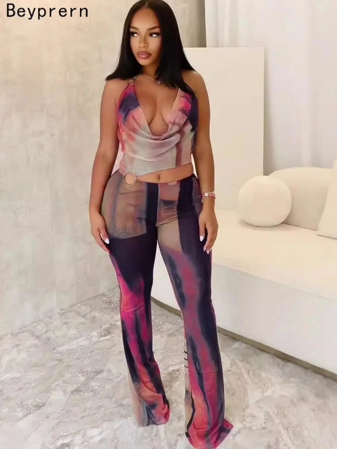 Woman wearing a colorful outfit with a blurred background