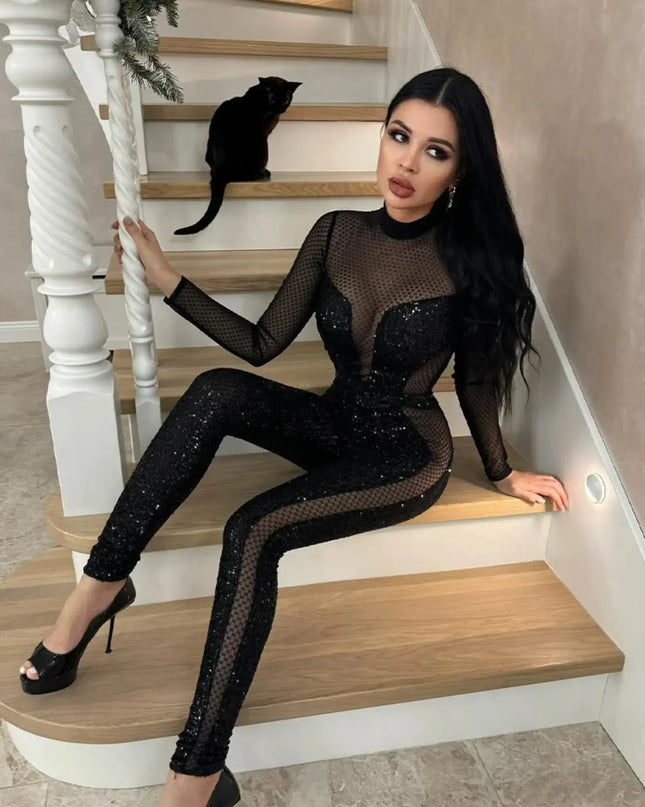 Woman in a black outfit sitting on a staircase with a cat beside her