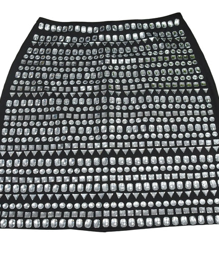 Black skirt with silver studs on a white background