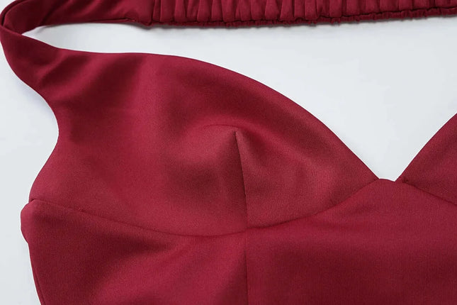 Elegant off shoulder mini dress party with a draped V neck design in deep burgundy showcasing its exquisite fabric and strapless style.