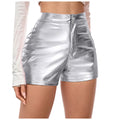 Silver metallic shorts worn by a person on a white background