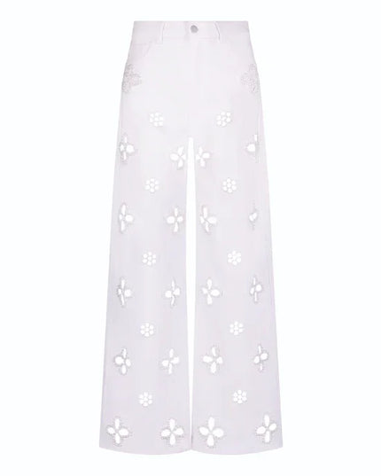 Casual hollow out women’s jeans in white with floral cut-out design and loose straight fit, perfect for trendy outfits.