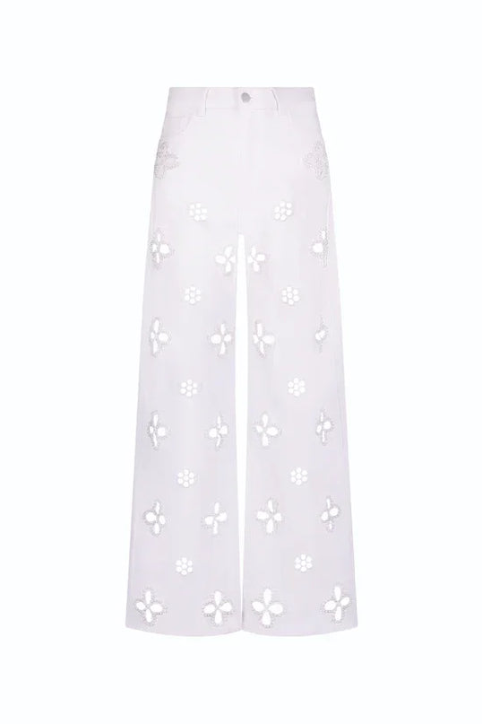 Casual hollow out women’s jeans in white with floral cut-out design and loose straight fit, perfect for trendy outfits.