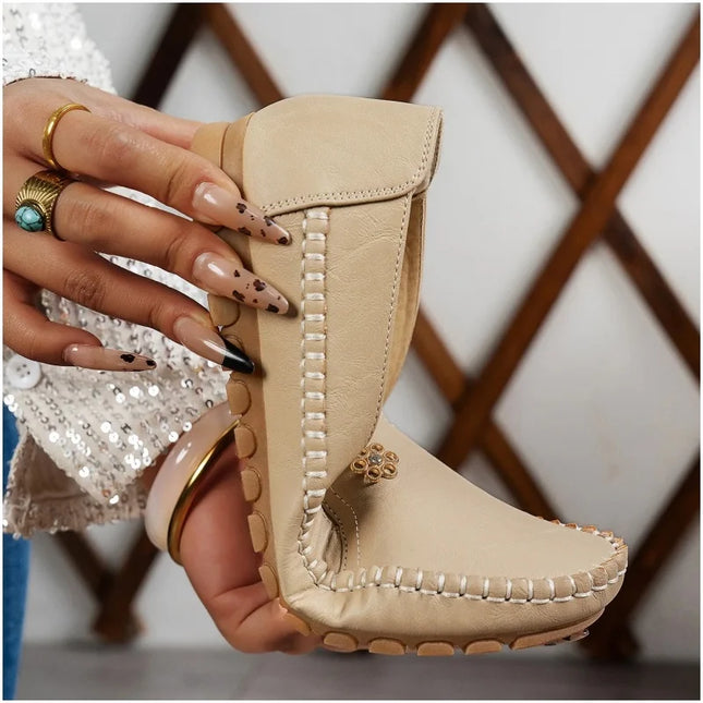 Comfortable women's loafers in beige with laser stitch detail, perfect for casual streetwear.