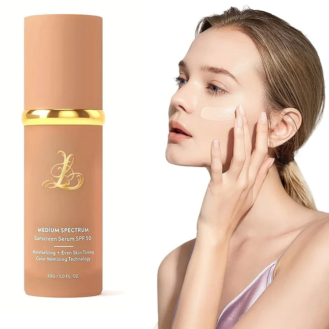 Woman applying sunscreen to her face with a bottle of sunscreen serum in the foreground.
