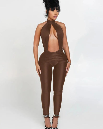 Woman wearing a brown leather jumpsuit on a white background