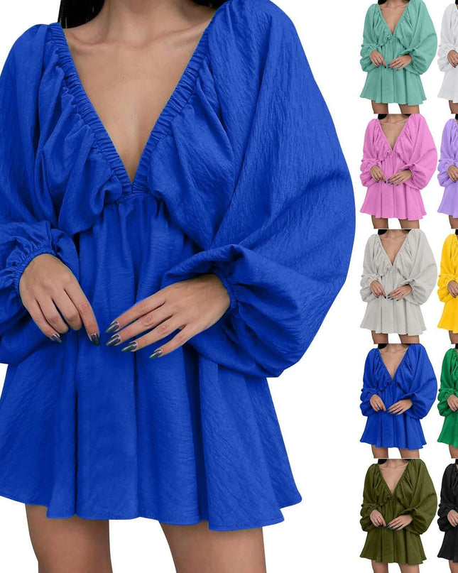 Blue dress with long sleeves and a plunging neckline, shown on a white background.