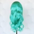 Teal wig on a mannequin head against a light background
