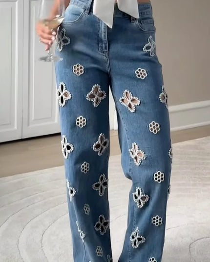 Casual hollow out women’s jeans showcasing a unique hollow-out design, perfect for a fashionable, relaxed look.