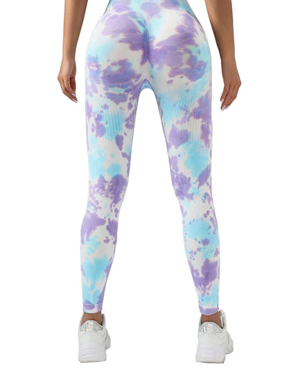 Multicolored tie-dye leggings worn by a person on a gray background