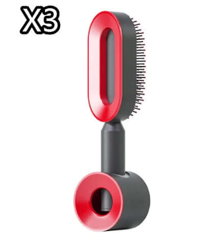 Red and black grooming brush with 'X3' branding on a white background