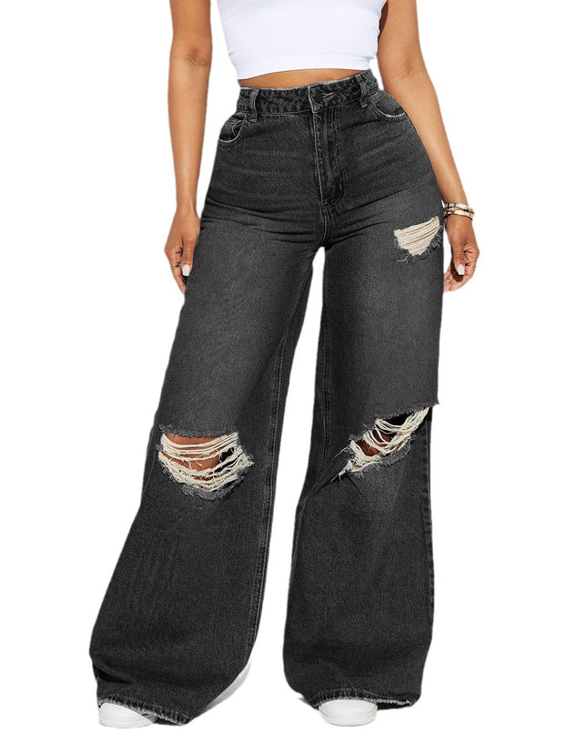 Black distressed wide-leg jeans worn by a person on a white background