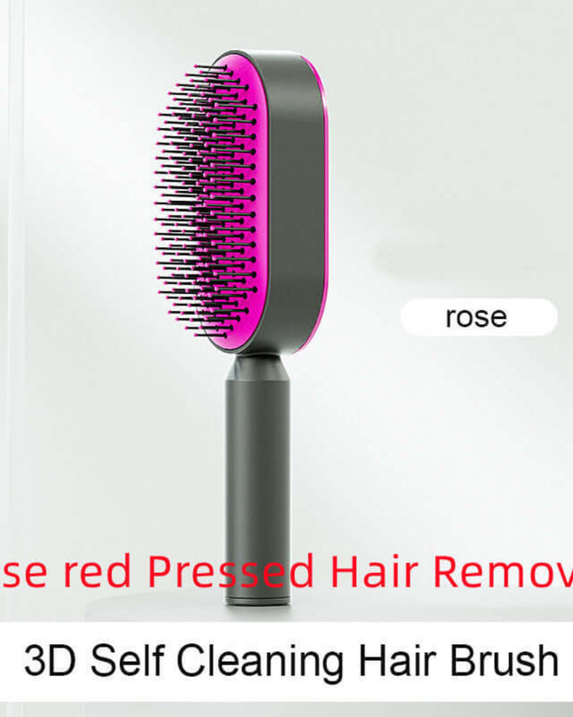 Hair removal brush with pink bristle head on a gray handle against a white background