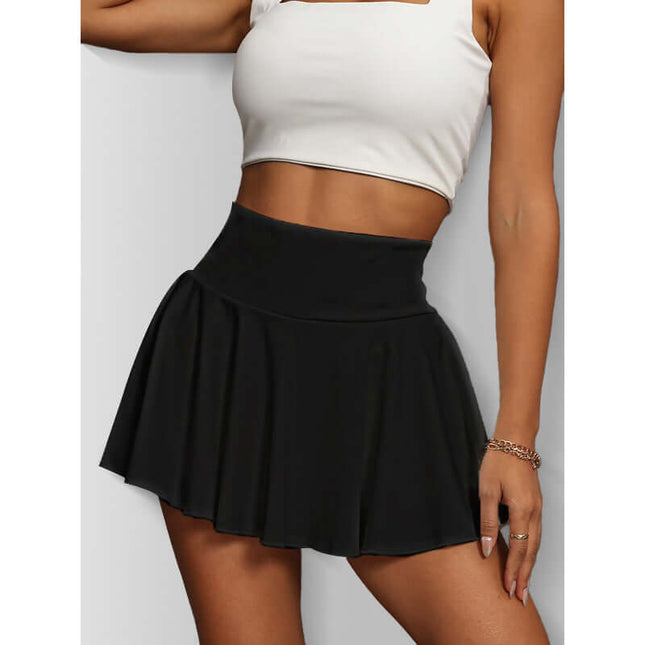 High-waisted black women tennis skirt with flared design for athletic workouts and outdoor activities.