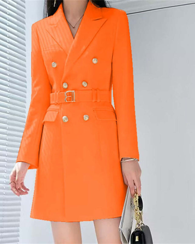 Orange double-breasted coat worn by a person with a neutral background