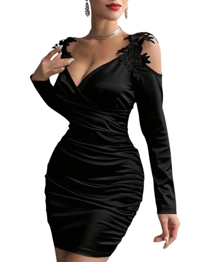 Black dress with long sleeves and lace details on a white background